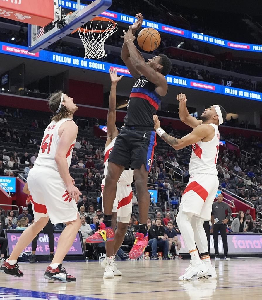 Jalen Duren Detroit Pistons Rebounding | GGSLOT | Sports & Games News Jalen Duren of the Detroit Pistons securing a powerful offensive rebound over multiple defenders.