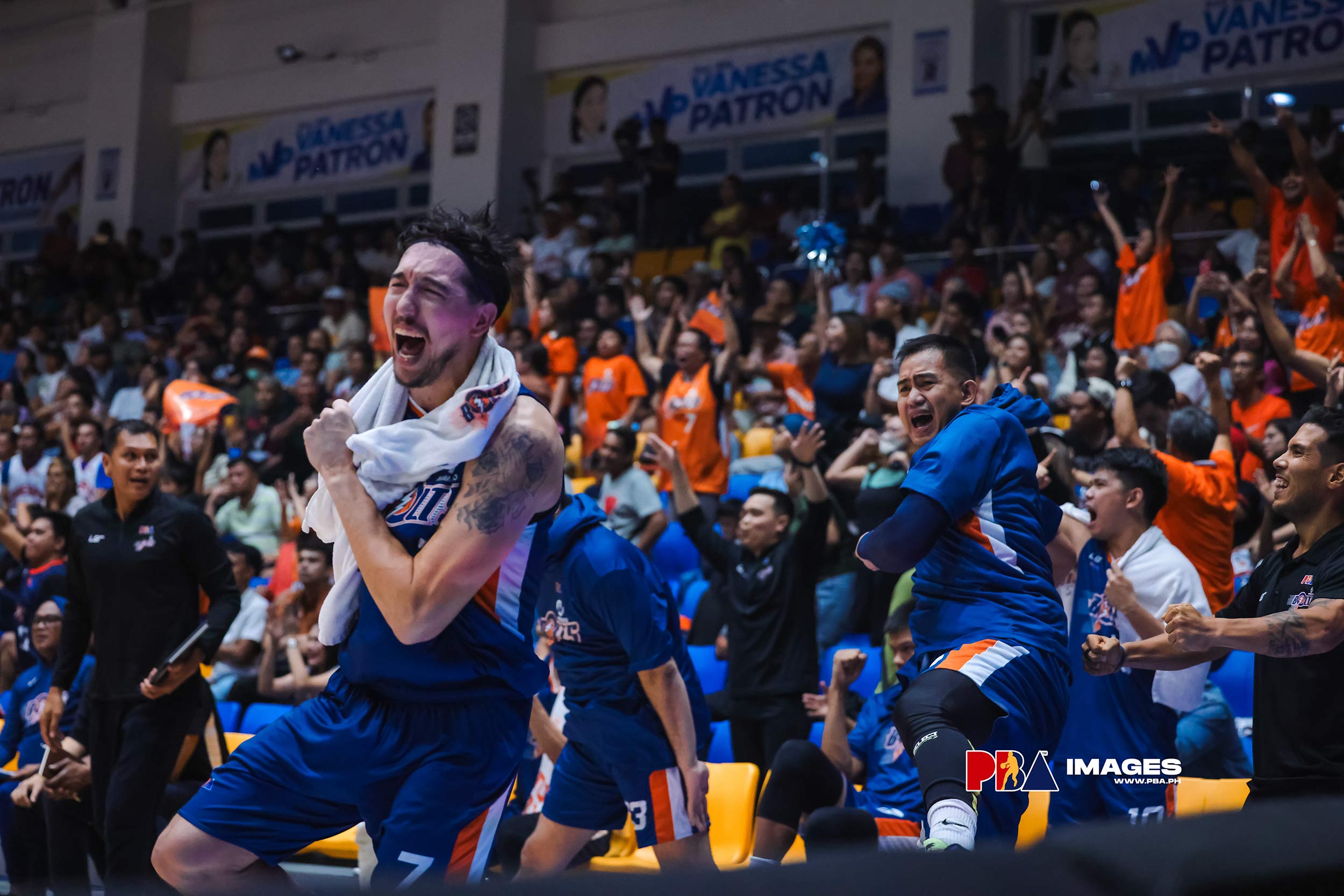 Meralco players | GGSLOT | Sports & Games News Meralco Bolts bench players cheering for their teammates during a PBA game.