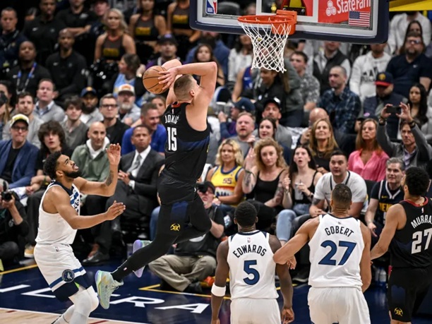 Nikola Jokic | GGSLOT | Sports & Games News Nikola Jokić driving to the basket and finishing a dunk while leading the Denver Nuggets