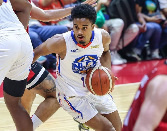 Schonny Winston | GGSLOT | Sports & Games News Schonny Winston of the NLEX Road Warriors driving to the basket while handling the ball during a PBA Season 50 game.