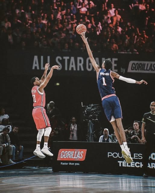 Spurs center Victor Wembanyama utilizes his reach to block a shot, helping San Antonio climb the NBA Playoff Standings.