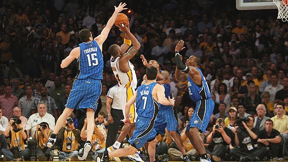 A clutch basketball shot going through the hoop during the post-season race.