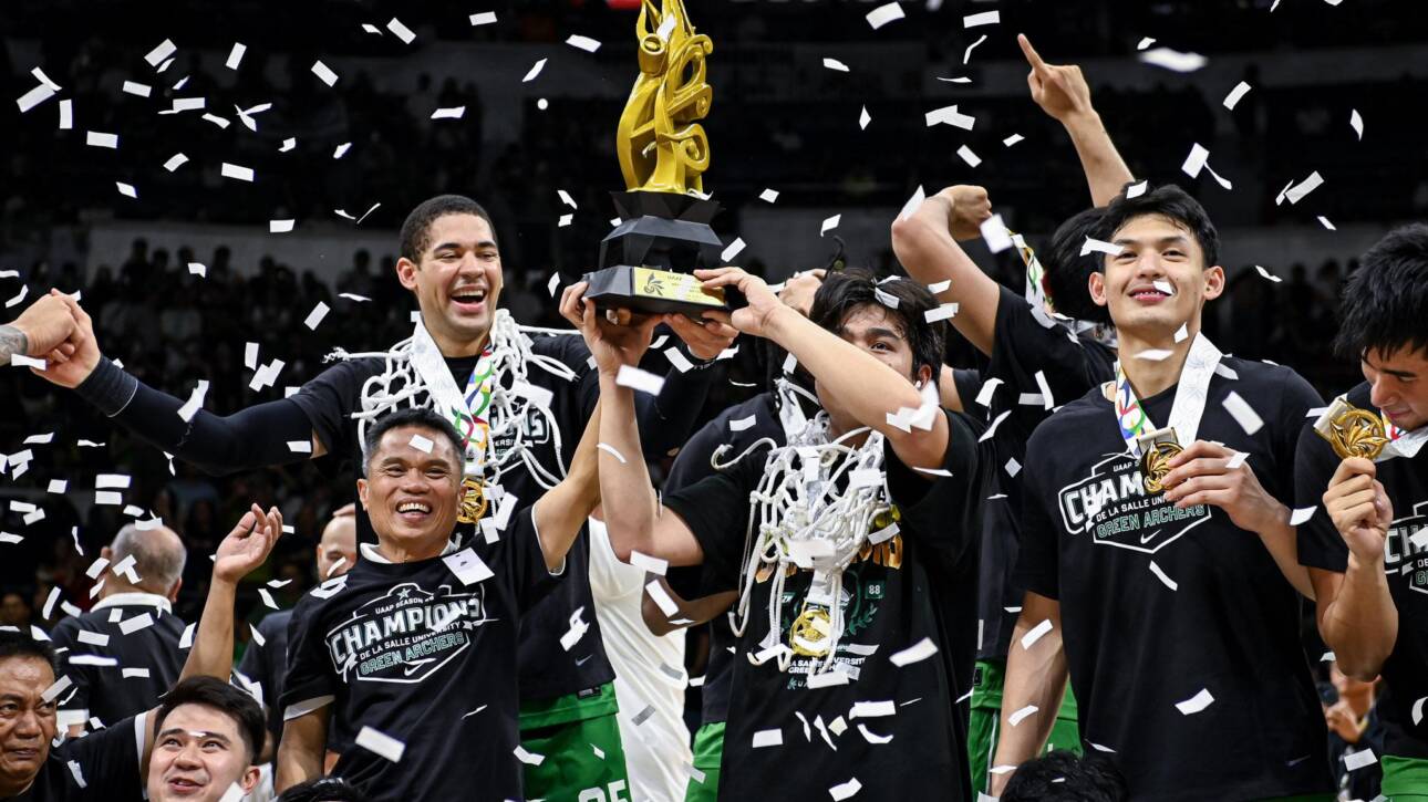 DLSU Green Archers basketball team holding the UAAP Season 88 trophy during a victory parade