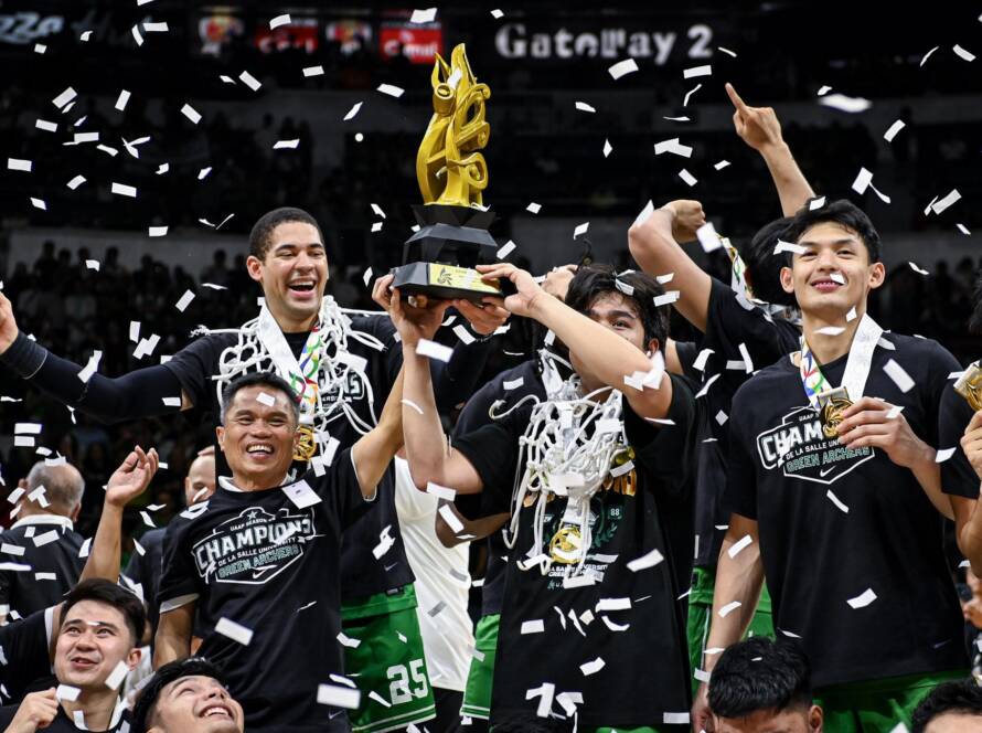 DLSU Green Archers basketball team holding the UAAP Season 88 trophy during a victory parade