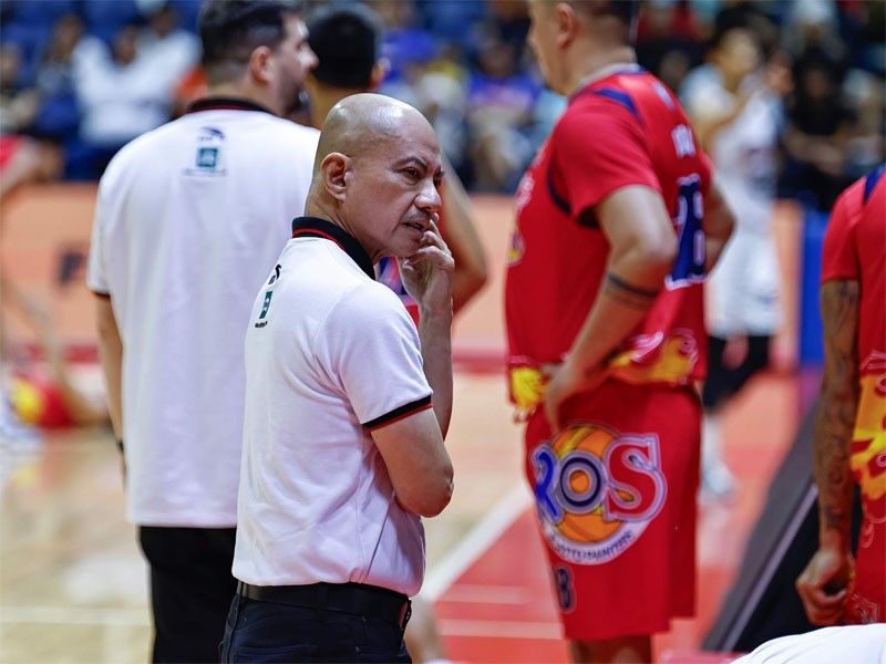 Coach Yeng Guiao directing the Rain or Shine PBA bench during a game