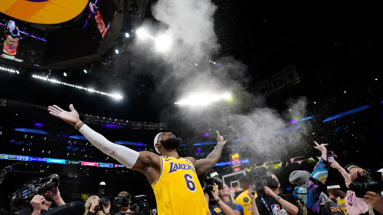 LeBron James celebrating a historic playoff milestone during the NBA Playoffs