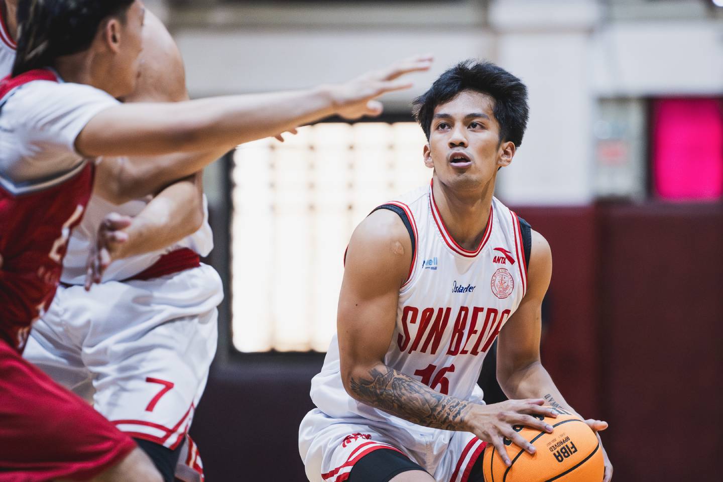 daniel-marcelo-san-beda-red-lions-drive | GGSLOT | Sports & Games News san beda red lions guard daniel marcelo drives past a defender