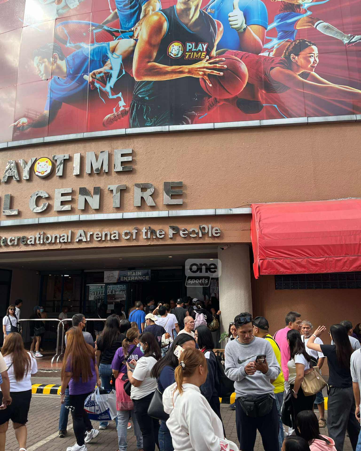Fans lining up outside Playtime Filoil Centre before entering a 2026 sporting event.