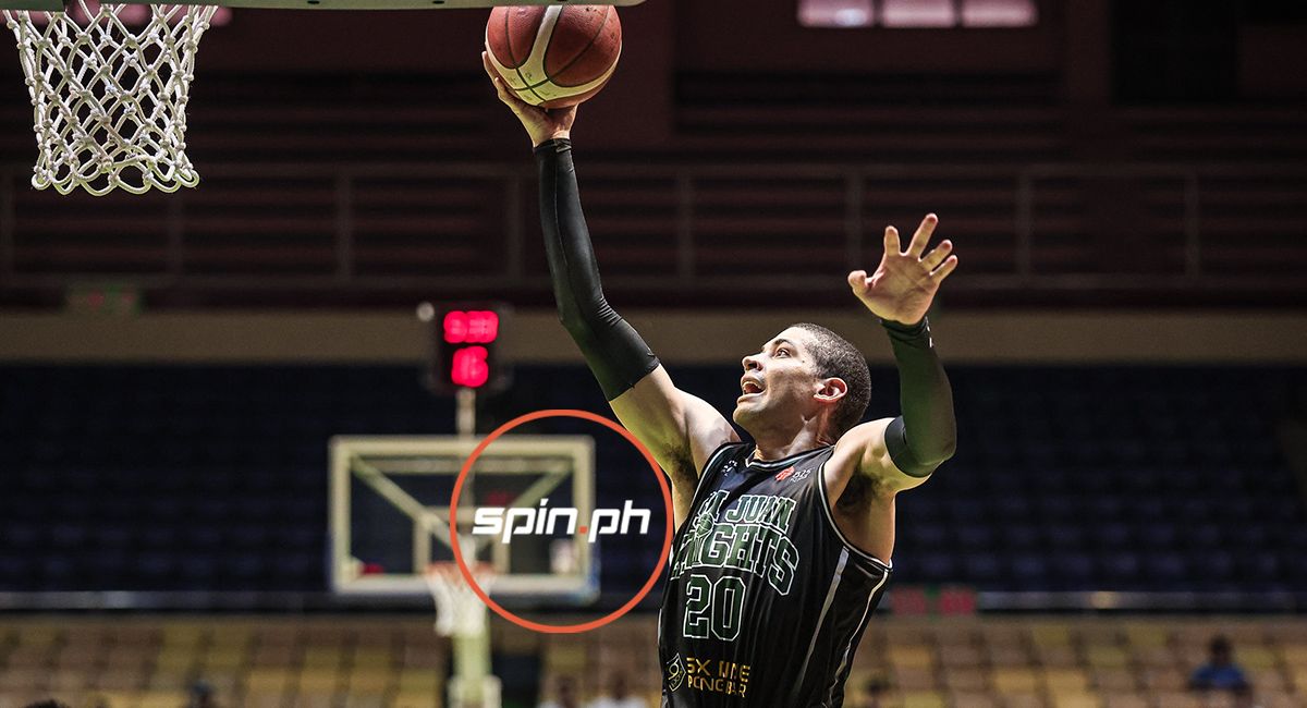 Mike Phillips of the San Juan Knights aggressively leaping for a rebound during a 2026 MPBL game.