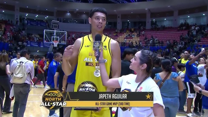 A Pilipinas Live PBA reporter interviewing an import player after a game.