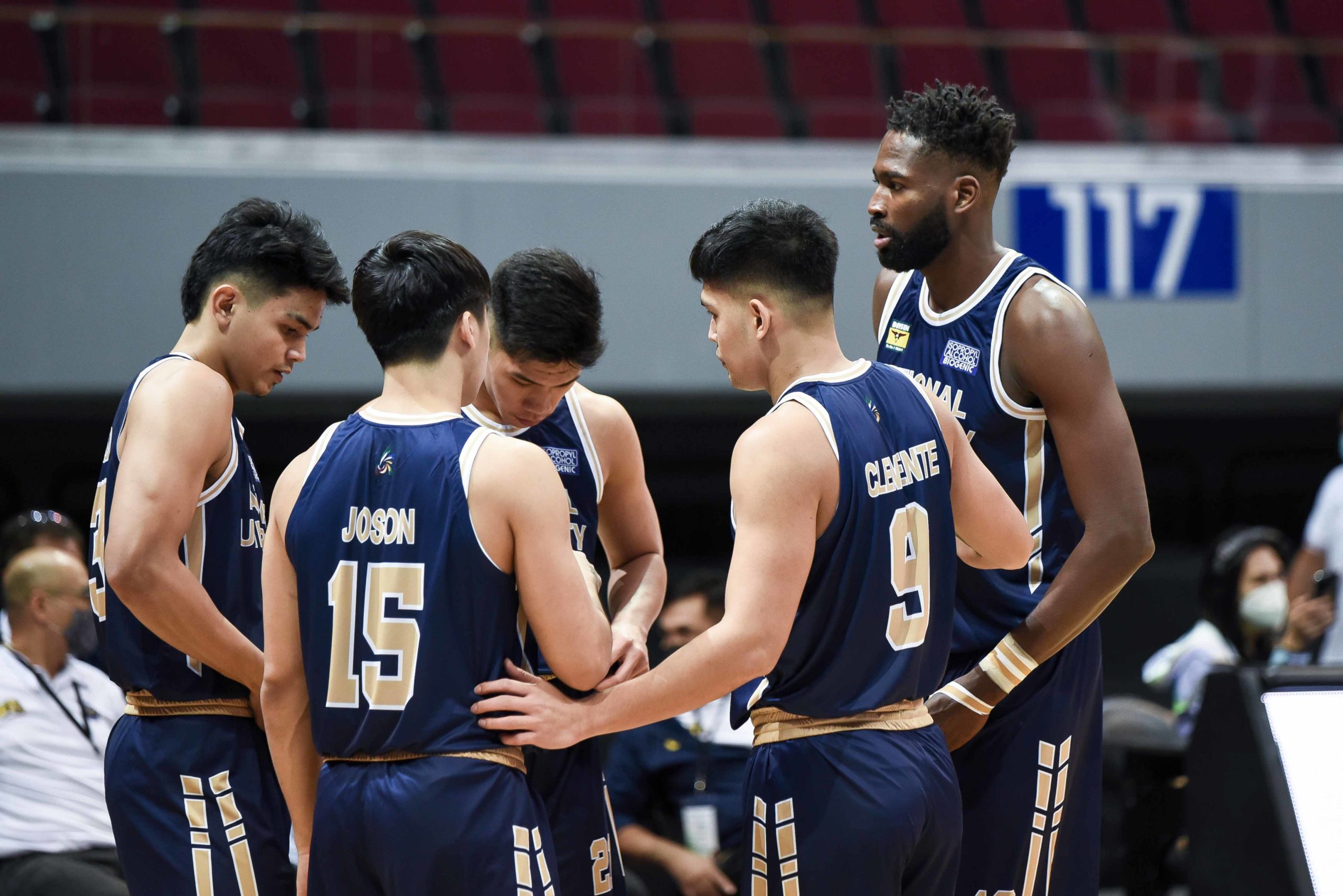 The UP Fighting Maroons players in a tight huddle during a timeout in the 19th Filoil EcoOil Preseason Cup.