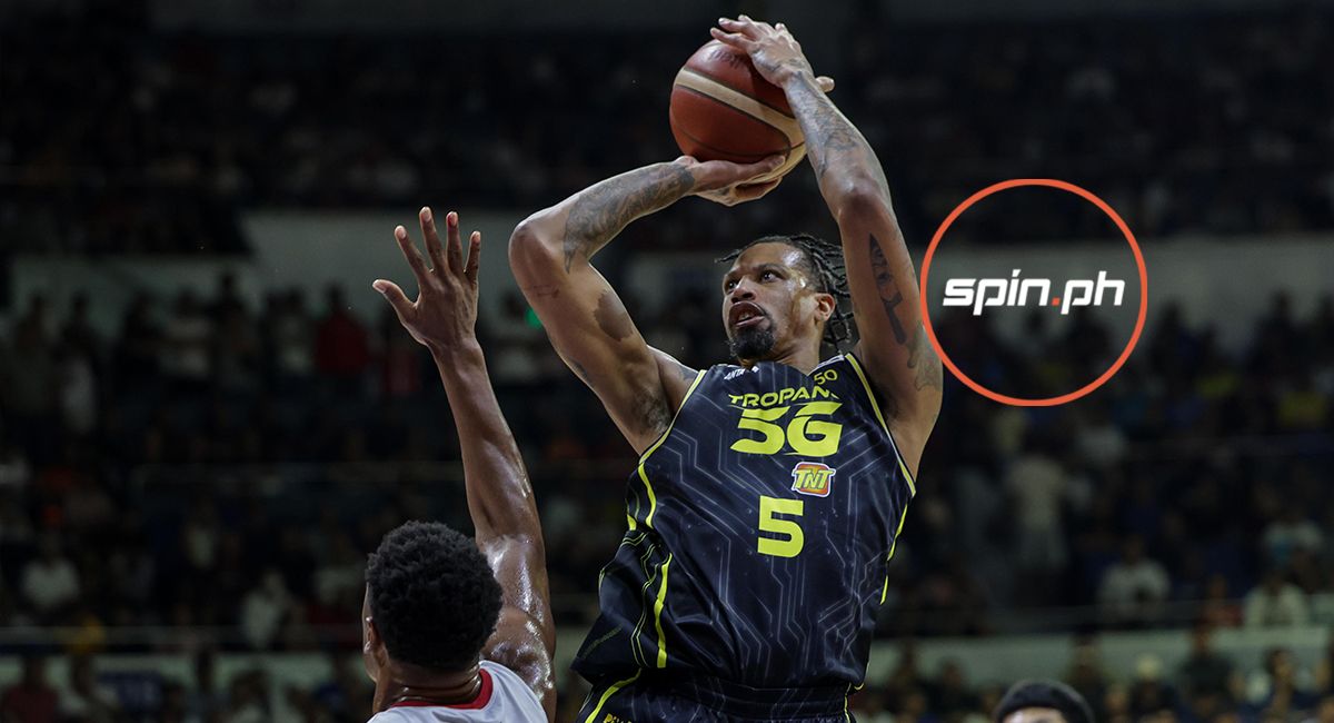 Justin Brownlee driving to the basket against Chris McCullough's defense.