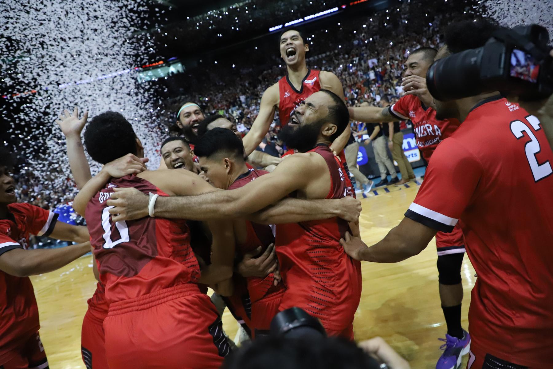 ginebra-game-6-win | GGSLOT | Sports & Games News Barangay Ginebra players celebrating their Game 6 victory to advance to the PBA Finals 2026