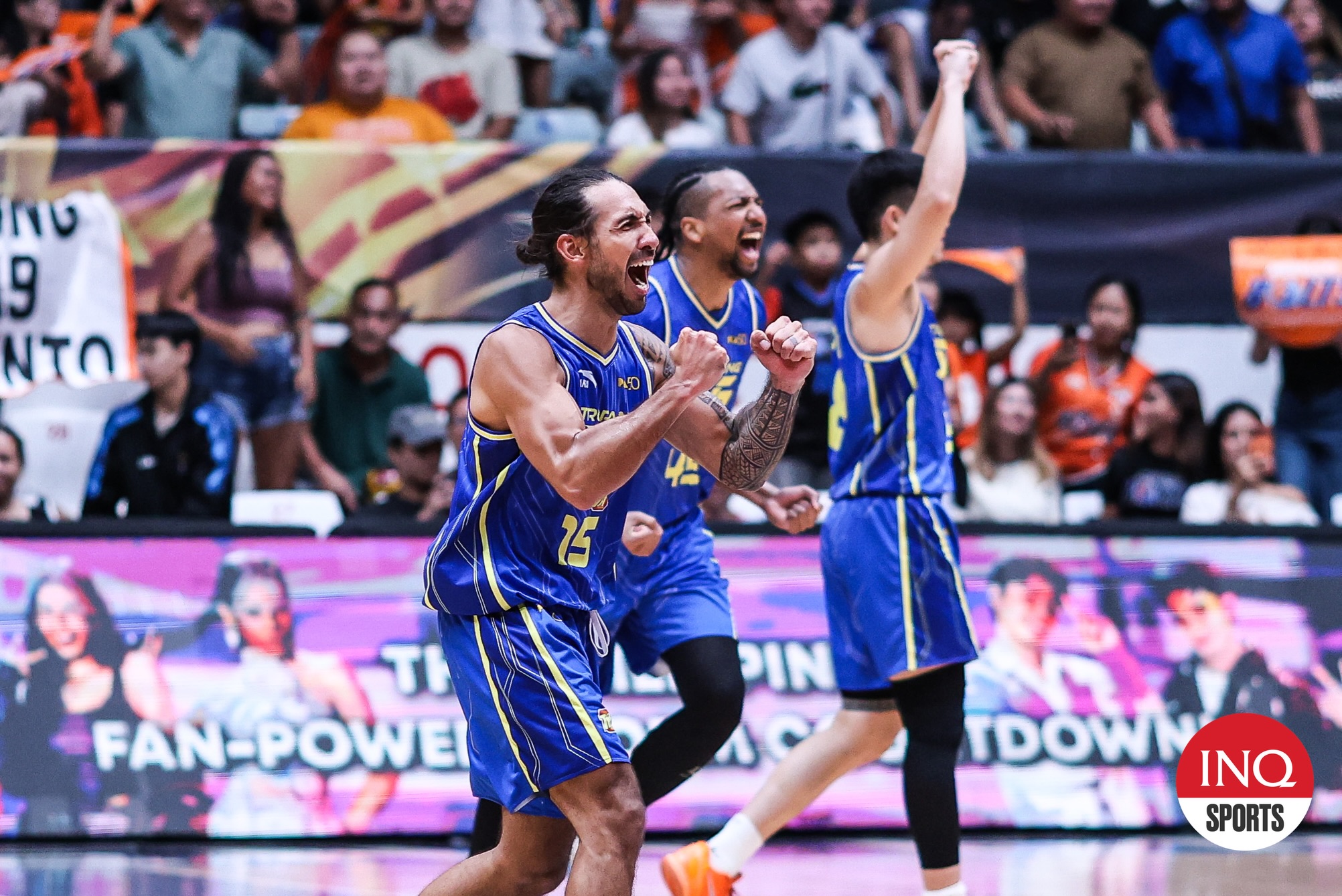 ginebra-game-6-win | GGSLOT | Sports & Games News Barangay Ginebra players celebrating their Game 6 victory to advance to the PBA Finals 2026