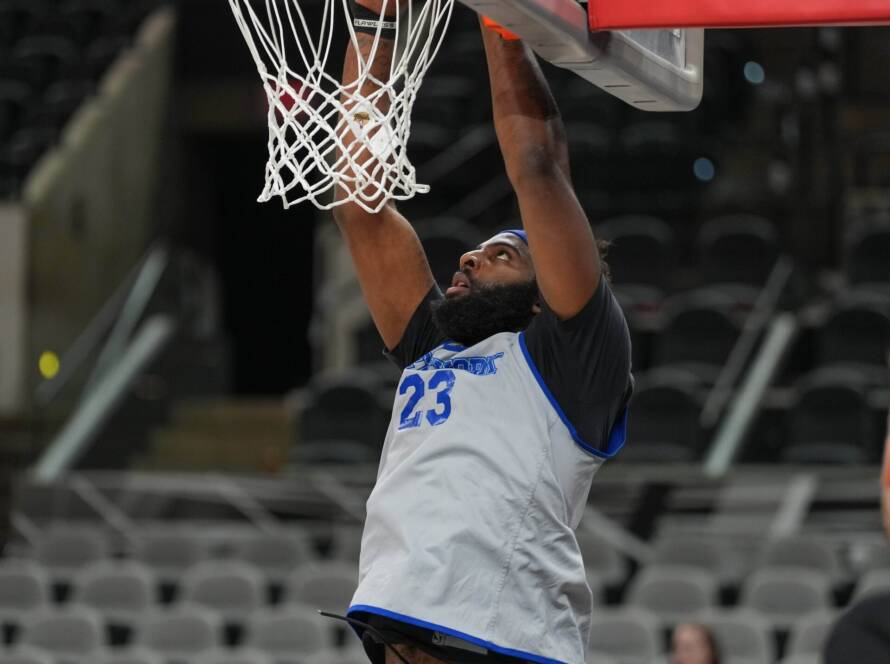 Mitchell Robinson grabbing a crucial rebound against the Spurs in the NBA Finals.