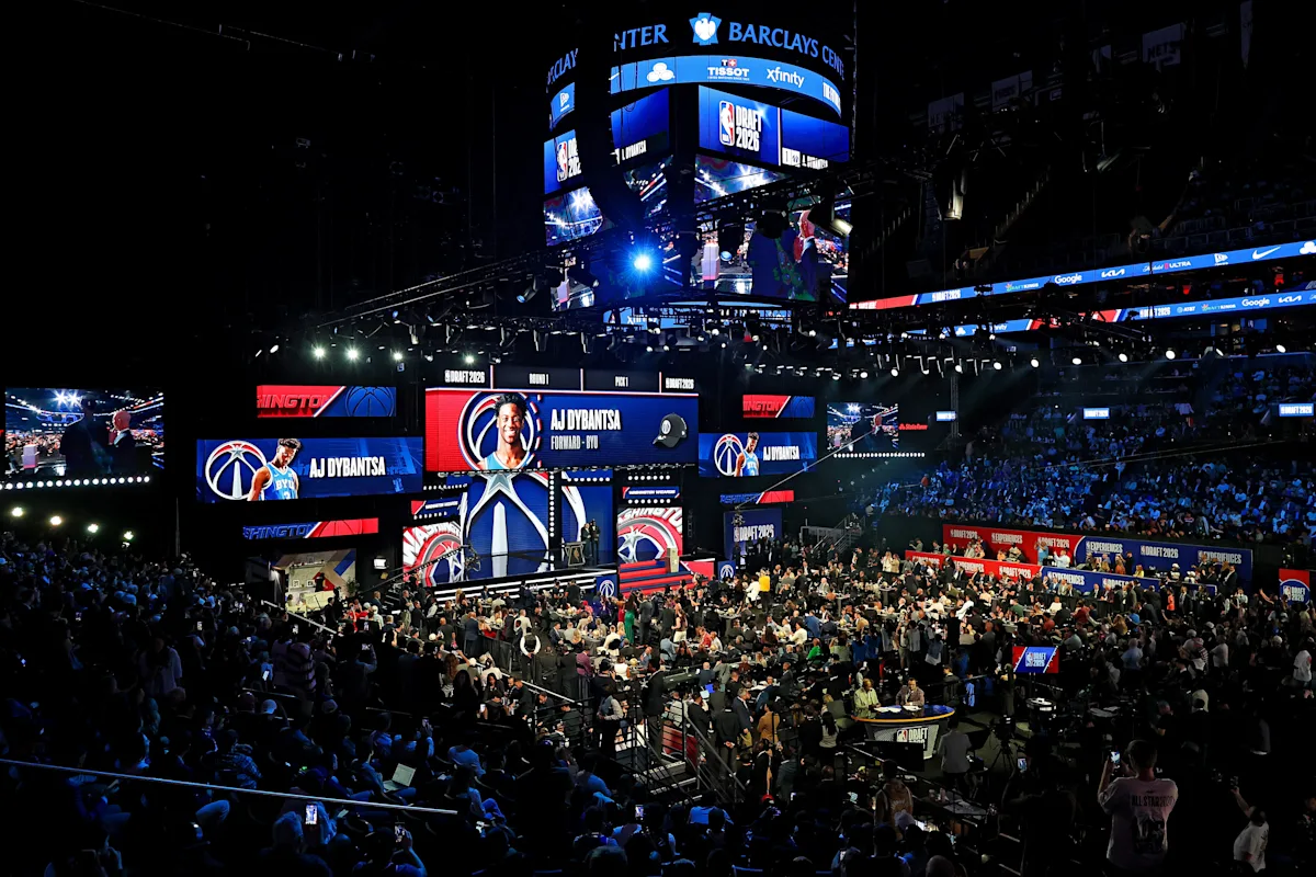 The official podium and draft boards at the 2026 NBA Draft inside the Barclays Center.