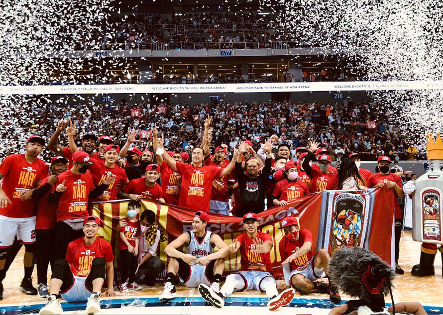 Barangay Ginebra players celebrating their hard-fought victory in Game 1 of the 2026 PBA Finals against TNT