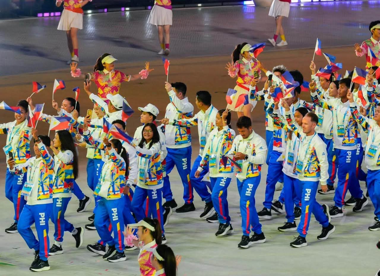 philippine-sports-delegation-asian-games | GGSLOT | Sports & Games News Athletes representing the Philippine sports delegation marching proudly, signaling a historic turnout for the upcoming Asian Games.