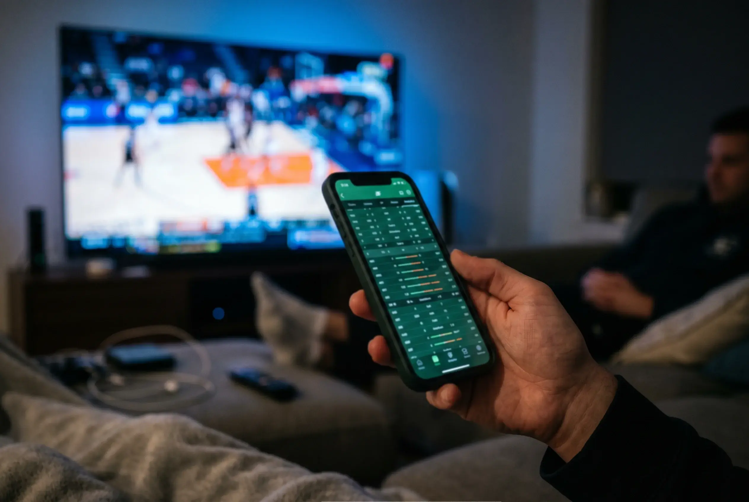 sports-betting-app-fiba-odds | GGSLOT | Sports & Games News A smartphone displaying basketball betting odds for a FIBA match.