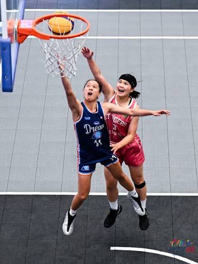 wmpbl-finals-khate-castillo-shooting | GGSLOT | Sports & Games News A female professional basketball player in the Philippines releasing a three-point jump shot during the intense Women's Maharlika Pilipinas Basketball League Finals.