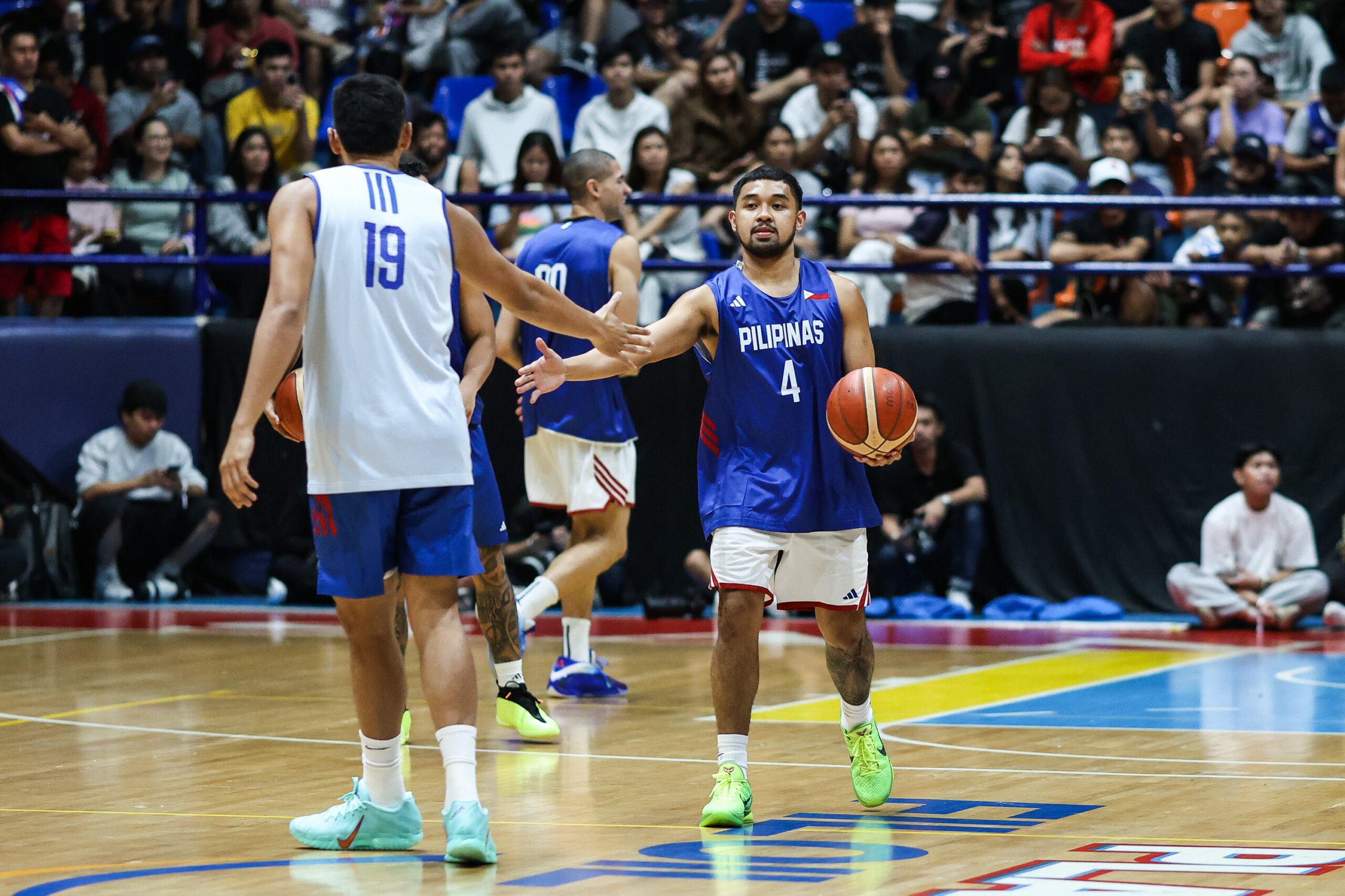 Gilas Pilipinas Away Qualifie | GGSLOT | Sports & Games News Gilas Pilipinas players defending intensely during an international basketball qualifier.