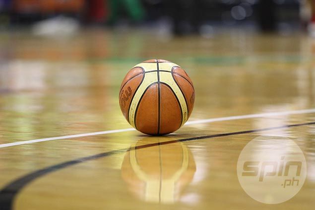 ateneo-blue-eagles-uaap-season-89 | GGSLOT | Sports & Games News A lone basketball on an empty court, symbolizing a period of reflection for the Ateneo Blue Eagles in UAAP Season 89.