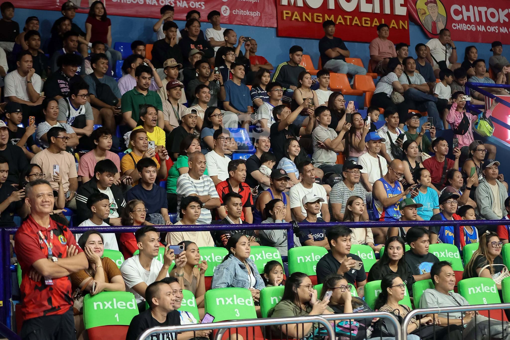 filoil-ecooil-preseason-cup-arena-crowd | GGSLOT | Sports & Games News Packed crowd at the Filoil Centre during a collegiate basketball game.