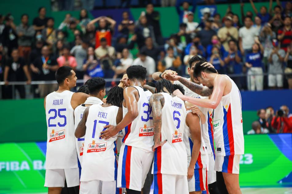 Gilas Pilipinas players huddle during the FIBA Asian Qualifiers.