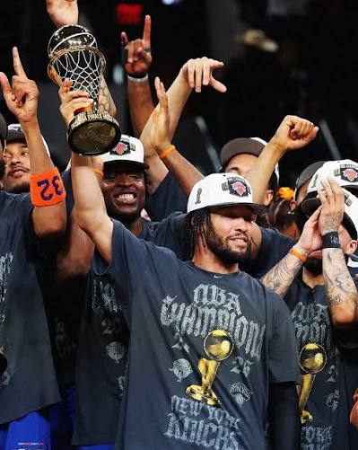 nba-finals-mvp-2026-championship-trophy-celebration | GGSLOT | Sports & Games News A dramatic NBA Finals MVP 2026 trophy celebration on a podium with confetti falling.